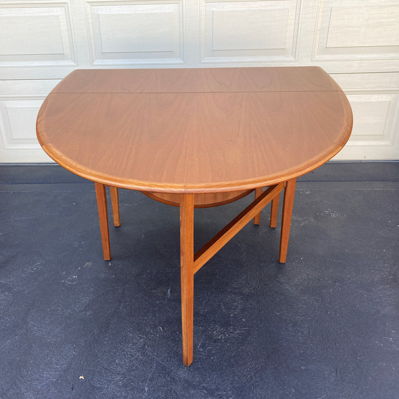 Golden teak Authentic Parker oval dining table MCM extendable drop 1960s